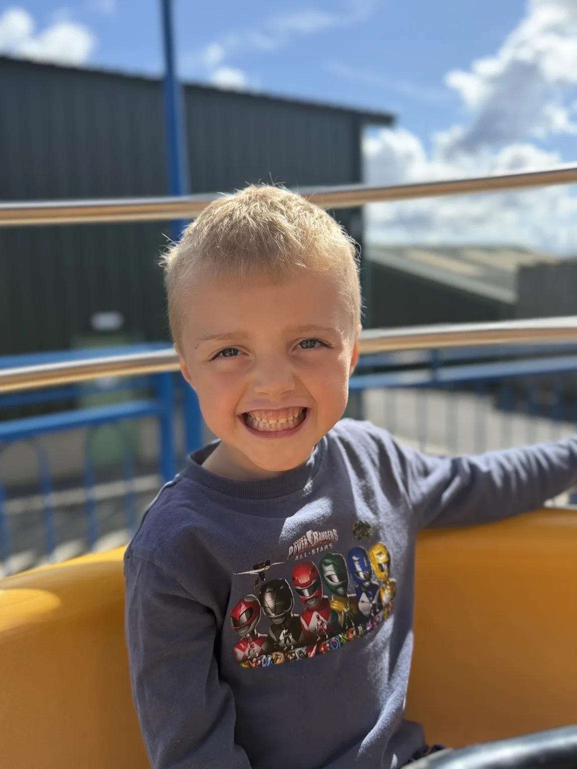 Harry smiling on a ride